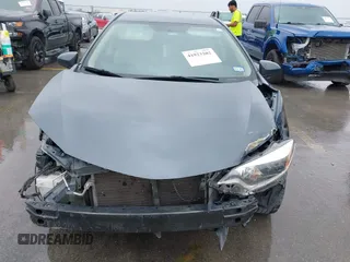2015 Toyota Corolla L z VIN 2T1BURHE7FC271928, wystawiony jako IAAI lot #41923202 z przebiegiem 194 181 mil mil oraz . Historia ofert i sprzedaży dostępna na DreamBid. Obrazek 13.
