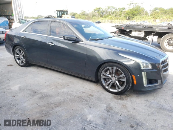 2014 Cadillac CTS Vsport Premium RWD z VIN 1G6AV5S80E0171279, wystawiony jako Copart lot #63759434 z przebiegiem 129 154 mil mil oraz Szkody całkowita. Historia ofert i sprzedaży dostępna na DreamBid. Obrazek 4.