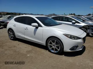 2016 Mazda 3 S Touring with VIN JM1BM1M32G1355182, listed as a Copart auction lot 61582365 with 144,159 mi miles and Salvage title. Bid and sale history available at DreamBid. Image 4.