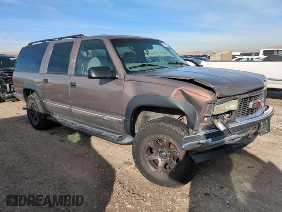 1998 GMC Suburban z VIN 3GKFK16R4WG507685, wystawiony jako Copart lot #87900735 z przebiegiem 183 033 mil mil oraz Szkoda całkowita • Salvage title. Historia ofert i sprzedaży dostępna na DreamBid. Obrazek 4.