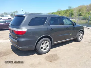 2011 Dodge Durango Crew with VIN 1D4RE4GG4BC599282, listed as a IAAI auction lot 42228048 with 150,514 mi miles and . Bid and sale history available at carsss.com. Image 4.