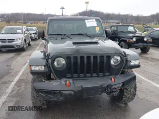 2022 Jeep Gladiator Mojave z VIN 1C6JJTEG8NL130971, wystawiony jako IAAI lot #41163074 z przebiegiem 47 142 mil mil oraz . Historia ofert i sprzedaży dostępna na DreamBid. Obrazek 13.