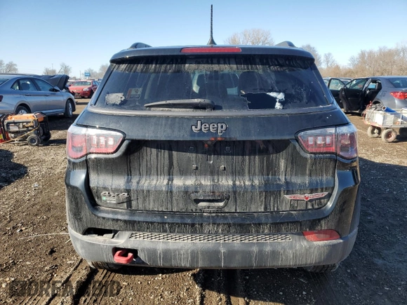 2019 Jeep Compass Trailhawk with VIN 3C4NJDDB1KT727756, listed as a Copart auction lot 42439055 with 104,525 mi miles and Salvage Title. Bid and sale history available at carsss.com. Image 6.