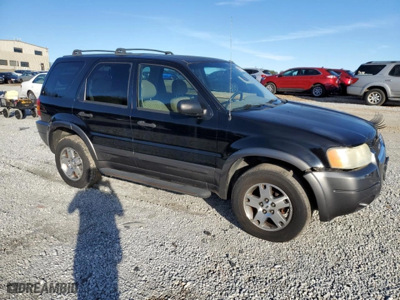 2004 Ford Escape XLT with VIN 1FMYU031X4KB40235, listed as a Copart auction lot 88357735 with 186,797 mi miles and Salvage Title. Bid and sale history available at carsss.com. Image 4.