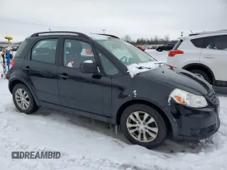 2013 Suzuki SX4 with VIN JS2YB5A44D6100218, listed as a Copart auction lot 43558615 with 165,025 mi miles and Salvage Title. Bid and sale history available at DreamBid. Image 4.