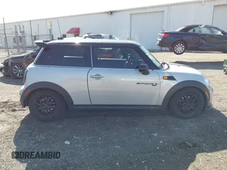 2013 MINI Cooper Hardtop with VIN WMWSU3C56DT683555, listed as a IAAI auction lot 41871323 with 102,527 mi miles. Bid and sale history available at carsss.com. Image 13.