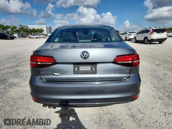 2017 Volkswagen Jetta S with VIN 3VW2B7AJ9HM344306, listed as a Copart auction lot 60256965 with 23,055 mi miles and Salvage title. Bid and sale history available at DreamBid. Image 6.