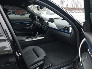 2018 BMW 3 Series 330i xDrive with VIN WBA8D9C59JA012658, listed as a IAAI auction lot 41523677 with 117,049 mi miles and . Bid and sale history available at DreamBid. Image 5.