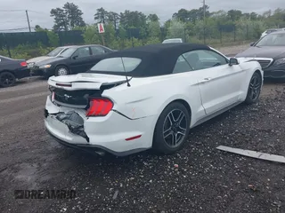 2022 Ford Mustang EcoBoost z VIN 1FATP8UH3N5104988, wystawiony jako IAAI lot #42320593 z przebiegiem 51 101 mil mil oraz . Historia ofert i sprzedaży dostępna na DreamBid. Obrazek 4.