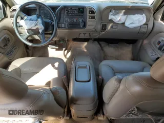 1999 GMC Suburban z VIN 3GKGK26J2XG514835, wystawiony jako Copart lot #47853685 z przebiegiem 124 657 mil mil oraz Tytuł czysty. Historia ofert i sprzedaży dostępna na DreamBid. Obrazek 8.