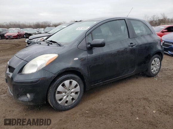 2011 Toyota Yaris with VIN JTDJT4K37B5339113, listed as a Copart auction lot 82474554 with 148,800 mi miles and Salvage Title. Bid and sale history available at carsss.com. Image 1.