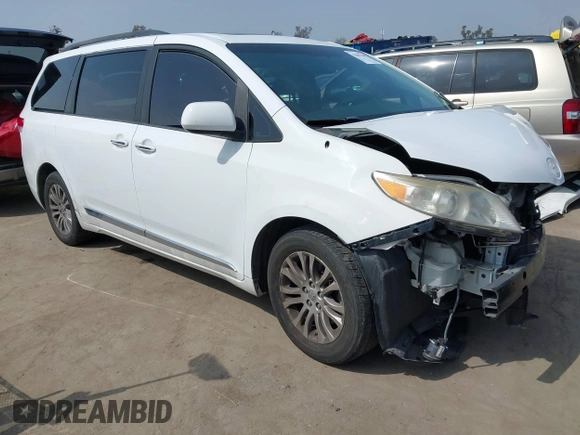 2014 Toyota Sienna XLE z VIN 5TDYK3DC7ES461445, wystawiony jako IAAI lot #42003360 z przebiegiem 153 404 mil mil oraz . Historia ofert i sprzedaży dostępna na DreamBid. Obrazek 1.