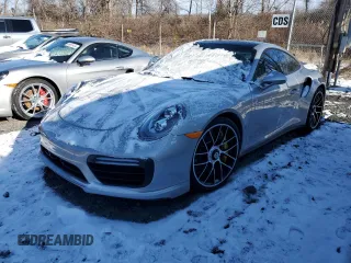 2017 Porsche 911 Turbo S z VIN WP0AD2A9XHS166494, wystawiony jako Copart lot #86107354 z przebiegiem Nie podano mil oraz Nie do naprawy • Non repairable. Historia ofert i sprzedaży dostępna na DreamBid. Obrazek 1.