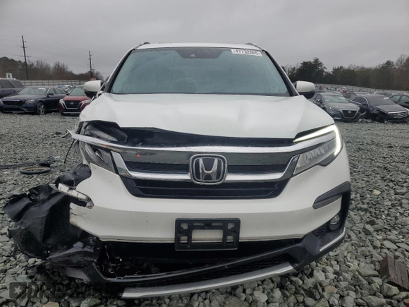 2020 Honda Pilot Touring 8-Passenger with VIN 5FNYF6H95LB053631, listed as a Copart auction lot 47732865 with 67,728 mi miles and Salvage Title. Bid and sale history available at DreamBid. Image 5.