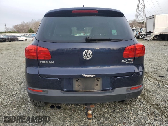 2013 Volkswagen Tiguan S with VIN WVGBV3AX0DW066778, listed as a Copart auction lot 85110984 with 108,027 mi miles and Salvage title. Bid and sale history available at DreamBid. Image 6.