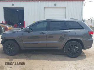 2018 Jeep Grand Cherokee Laredo E with VIN 1C4RJFAG7JC294905, listed as a IAAI auction lot 42452977 with 75,916 mi miles and . Bid and sale history available at DreamBid. Image 14.