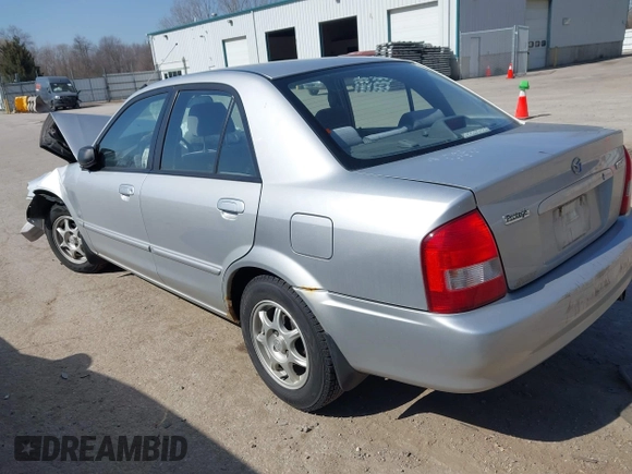 2000 Mazda Protege DX with VIN JM1BJ2227Y0240819, listed as a IAAI auction lot 41810228 with 68,650 mi miles and . Bid and sale history available at DreamBid. Image 3.