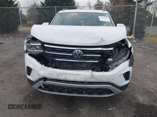 2023 Volkswagen Atlas SE with VIN 1V2KP2CA9PC556898, listed as a IAAI auction lot 40714688 with 53,598 mi miles and . Bid and sale history available at DreamBid. Image 6.