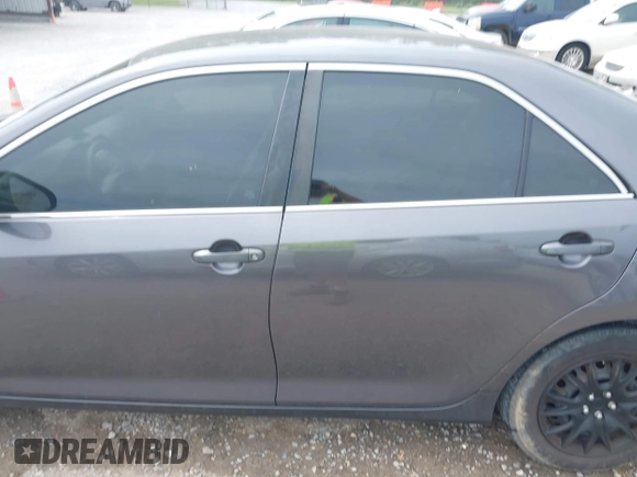 2014 Toyota Camry L with VIN 4T1BF1FK1EU771679, listed as a IAAI auction lot 42090764 with 216,362 mi miles and . Bid and sale history available at DreamBid. Image 14.
