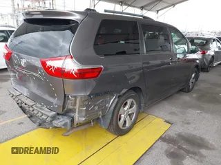 2015 Toyota Sienna LE AAS with VIN 5TDKK3DC8FS585957, listed as a IAAI auction lot 41888825 with 157,364 mi miles and . Bid and sale history available at DreamBid. Image 4.