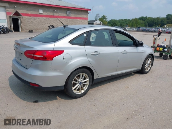 2015 Ford Focus SE с VIN 1FADP3F21FL203452, выставлен на аукционе IAAI как лот 40119573 с пробегом 143 915 миль миль и . История ставок и продаж доступна на DreamBid. Изображение 4.