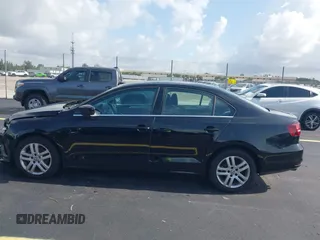 2017 Volkswagen Jetta S with VIN 3VW2B7AJ0HM285436, listed as a IAAI auction lot 42627136 with 88,873 mi miles and . Bid and sale history available at DreamBid. Image 14.