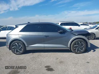 2024 Hyundai Ioniq 5 Limited z VIN KM8KR4DE2RU253057, wystawiony jako IAAI lot #41444014 z przebiegiem 6 185 mil mil oraz . Historia ofert i sprzedaży dostępna na DreamBid. Obrazek 13.