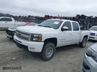 2009 Chevrolet Silverado 1500 LTZ with VIN 3GCEK33MX9G111454, listed as a IAAI auction lot 41148492 with 303,878 mi miles. Bid and sale history available at carsss.com. Image 14.
