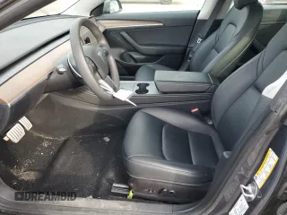 2023 Tesla Model 3 Performance z VIN 5YJ3E1EC4PF488873, wystawiony jako Copart lot #78991994 z przebiegiem 26 452 mil mil oraz Szkoda całkowita • Salvage title. Historia ofert i sprzedaży dostępna na DreamBid. Obrazek 7.