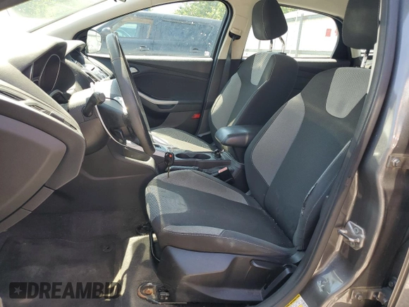 2012 Ford Focus SE z VIN 1FAHP3F23CL328787, wystawiony jako Copart lot #63186125 z przebiegiem 198 629 mil mil oraz Szkoda całkowita • Salvage title. Historia ofert i sprzedaży dostępna na DreamBid. Obrazek 7.