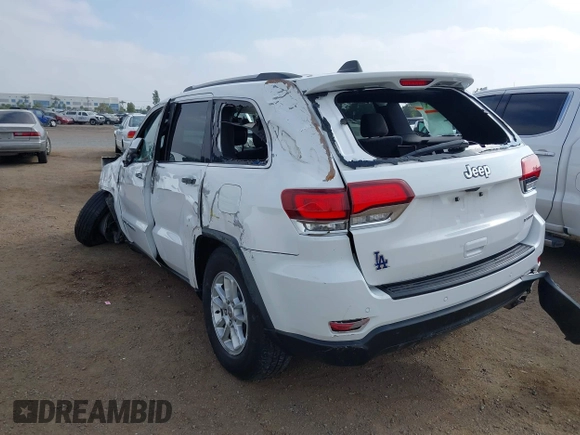 2020 Jeep Grand Cherokee Laredo E with VIN 1C4RJEAG4LC245884, listed as a IAAI auction lot 42564754 with 63,356 mi miles and . Bid and sale history available at DreamBid. Image 3.