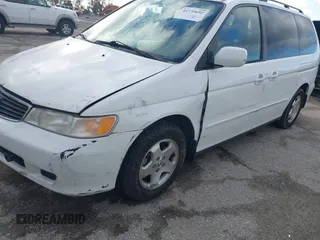 2000 Honda Odyssey EX z VIN 2HKRL1863YH589248, wystawiony jako IAAI lot #41735692 z przebiegiem 164 677 mil mil oraz . Historia ofert i sprzedaży dostępna na DreamBid. Obrazek 6.