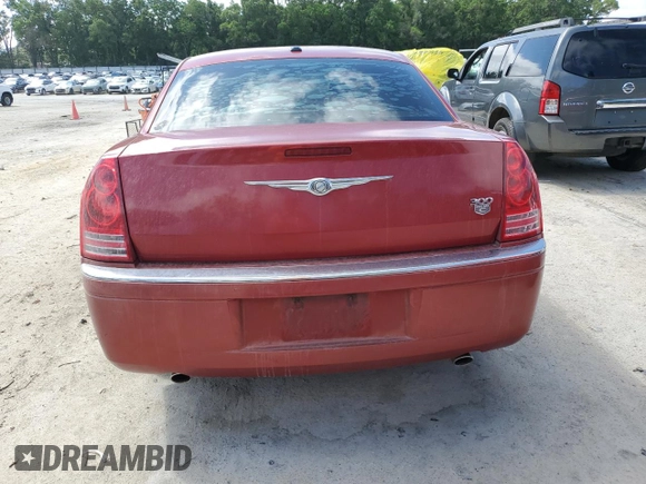 2009 Chrysler 300 with VIN 2C3KA63T49H551933, listed as a Copart auction lot 52088905 with 185,829 mi miles and Clean Title. Bid and sale history available at carsss.com. Image 6.