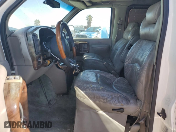 2000 Chevrolet Express Cargo Van w/YF7 with VIN 1GBFG15R6Y1167685, listed as a Copart auction lot 42994545 with 168,323 mi miles and Salvage Title. Bid and sale history available at carsss.com. Image 7.