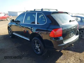 2005 Porsche Cayenne S with VIN WP1AB29P05LA63999, listed as a IAAI auction lot 41479500 with 157,957 mi miles. Bid and sale history available at carsss.com. Image 3.