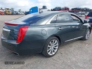 2017 Cadillac XTS Luxury with VIN 2G61M5S38H9162797, listed as a IAAI auction lot 41921355 with 74,920 mi miles and . Bid and sale history available at DreamBid. Image 4.