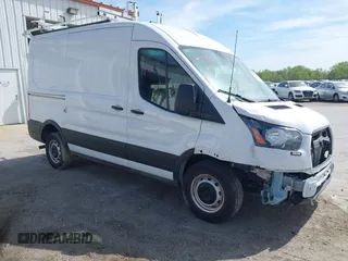 2023 Ford Transit Cargo with VIN 1FTYE1CG2PKB14938, listed as a IAAI auction lot 41964017 with 6,902 mi miles and . Bid and sale history available at DreamBid. Image 1.