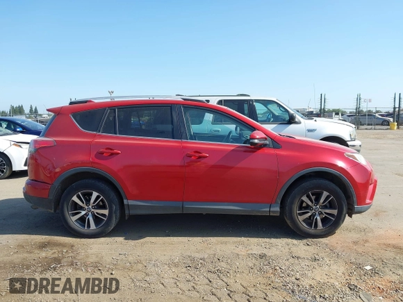 2016 Toyota RAV4 XLE z VIN 2T3RFREV2GW518664, wystawiony jako IAAI lot #42499525 z przebiegiem 226 076 mil mil oraz . Historia ofert i sprzedaży dostępna na DreamBid. Obrazek 13.