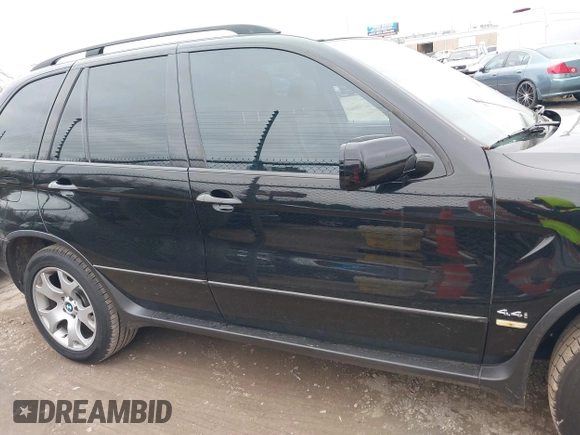 2002 BMW X5 4.4i with VIN 5UXFB33582LH31341, listed as a IAAI auction lot 41548139 with 82,188 mi miles. Bid and sale history available at carsss.com. Image 13.