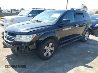 2012 Dodge Journey SXT with VIN 3C4PDDBG0CT300469, listed as a IAAI auction lot 42467233 with 127,420 mi miles and . Bid and sale history available at DreamBid. Image 2.