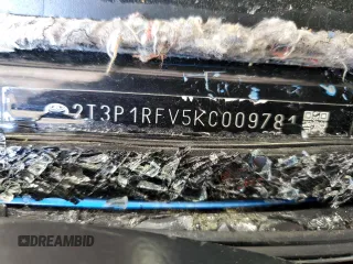 2019 Toyota RAV4 XLE with VIN 2T3P1RFV5KC009781, listed as a Copart auction lot 52262715 with Not Provided miles and Salvage Title. Bid and sale history available at DreamBid. Image 14.