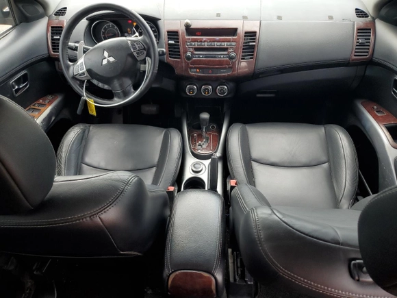 2010 Mitsubishi Outlander XLS with VIN JA4JT4AX5AZ009993, listed as a Copart auction lot 68136904 with 138,149 mi miles and Salvage Title. Bid and sale history available at carsss.com. Image 8.
