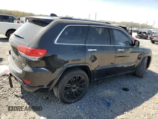 2015 Jeep Grand Cherokee Overland with VIN 1C4RJFCG3FC104439, listed as a Copart auction lot 50780295 with 196,549 mi miles and Salvage Title. Bid and sale history available at carsss.com. Image 3.