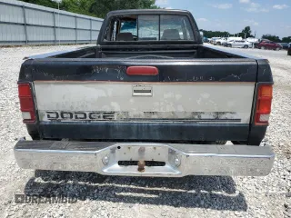 1995 Dodge Dakota z VIN 1B7GL23Y9SS385794, wystawiony jako Copart lot #63360094 z przebiegiem 394 435 mil mil oraz Szkoda całkowita • Salvage title. Historia ofert i sprzedaży dostępna na DreamBid. Obrazek 6.