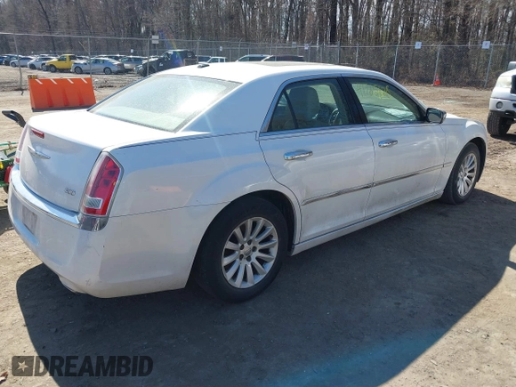 2013 Chrysler 300 with VIN 2C3CCAAG0DH508643, listed as a IAAI auction lot 41765128 with 203,871 mi miles. Bid and sale history available at carsss.com. Image 4.