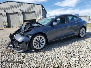 2022 Tesla Model 3 with VIN 5YJ3E1EA4NF371483, listed as a Copart auction lot 49287665 with 59,476 mi miles and Salvage Title. Bid and sale history available at DreamBid. Image 1.