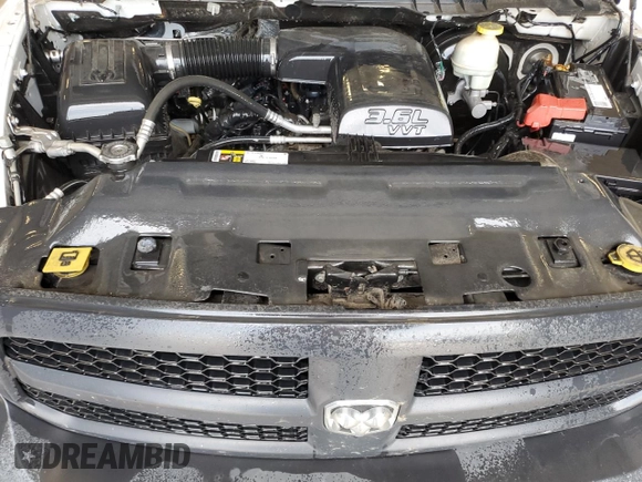 2017 Ram 1500 Tradesman z VIN 1C6RR6FG6HS661804, wystawiony jako Copart lot #53339615 z przebiegiem 154 532 mil mil oraz Czysty tytuł • Clean title. Historia ofert i sprzedaży dostępna na DreamBid. Obrazek 11.