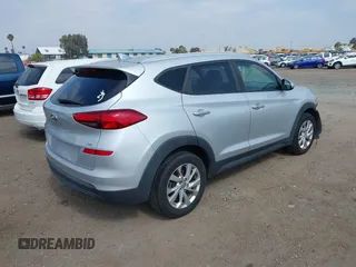 2019 Hyundai Tucson Value with VIN KM8J3CA46KU962082, listed as a IAAI auction lot 42160288 with 92,887 mi miles and . Bid and sale history available at DreamBid. Image 4.