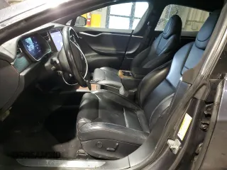 2017 Tesla Model S 100D with VIN 5YJSA1E29HF210731, listed as a Copart auction lot 56762565 with 114,117 mi miles and Salvage title. Bid and sale history available at DreamBid. Image 7.