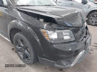 2020 Dodge Journey Crossroad with VIN 3C4PDCGB4LT263188, listed as a IAAI auction lot 41712652 with 92,639 mi miles and . Bid and sale history available at carsss.com. Image 6.